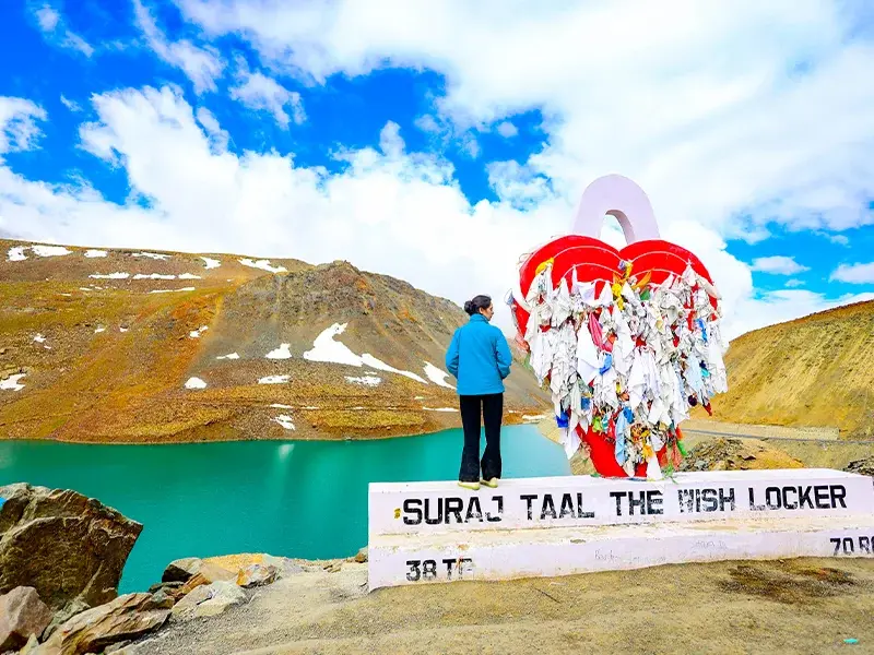 🏔️ Suraj Tal lake surrounded by mountains in Himachal Pradesh